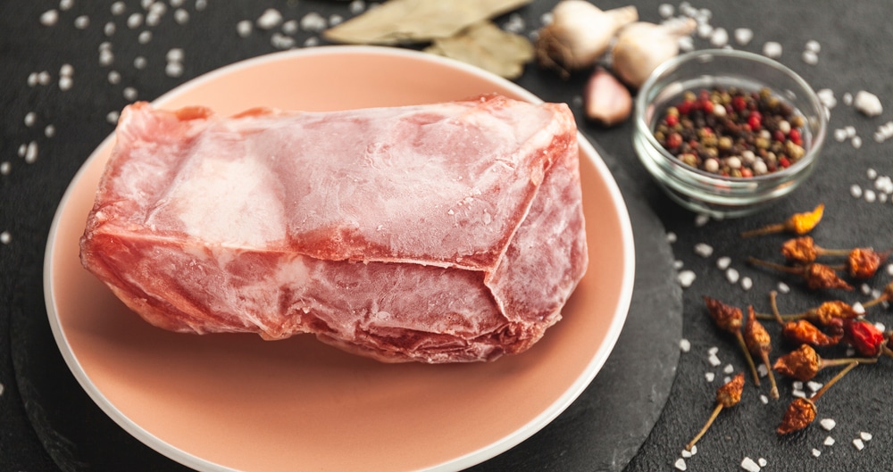 Frozen Raw Meat On Table