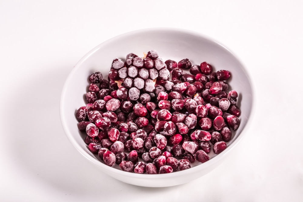 A bowl of well frozen pomegranate seeds